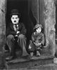 Charlie Chaplin et Jackie Coogan dans <i>The Kid</i>.